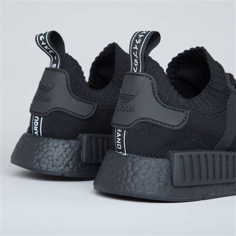 Adidas black NMD sneakers